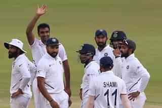 Indian off-spinner Ravichandran Ashwin celebrating with the teammates after a wicket. (Twitter@BCCI)
