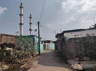 The mosque and the road in Harkhadi village