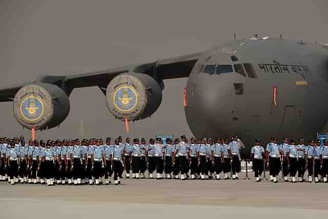 Indian Air Forcepersonnel march past a C-17 Globemaster during the Air Force Day parade on theoutskirts of New Delhi (MONEY SHARMA/AFP/GettyImages)