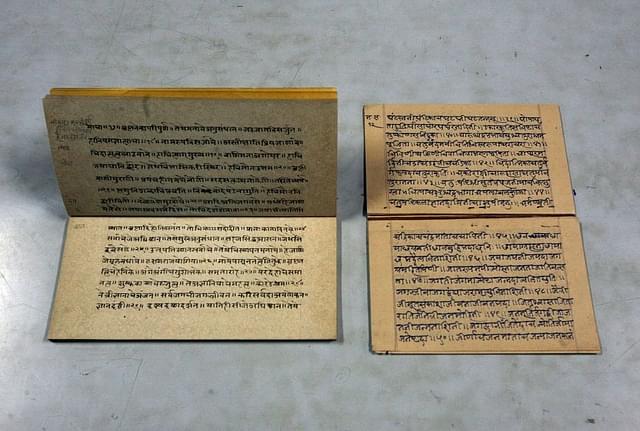 Specimen of Sanskrit handwritten manuscripts. (Kalpak Pathak/Hindustan Times via GettyImages)