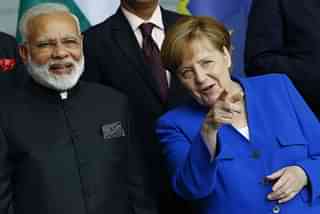 PM Narendra Modi and German Chancellor Angela Merkel (Michele Tantussi/Getty Images)