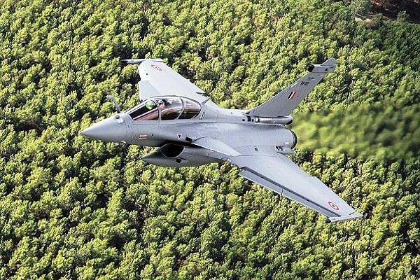 Rafale flying over a stretch of woods (G Gosset/Dassault Aviation)