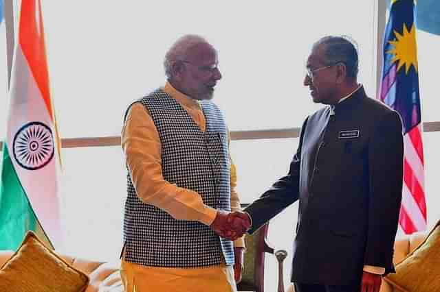 Prime Minister Narendra Modi with Malaysian counterpart Mahathir Mohamad in Kuala Lumpur. (MEAIndia/Twitter)