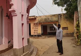 Shripal Singh points to the roof where he said Bunty stayed  during the night before temple row. (Swati Goel Sharma)