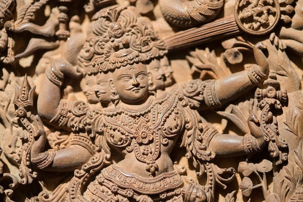 Shiva as the destroyer of the three cities of the demons (Tripurantaka). &nbsp;