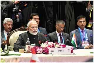 Prime Minister Narendra Modi, External Affairs Minister S Jaishankar and MEA officers at the India-ASEAN summit. (@MEAIndia/Twitter)