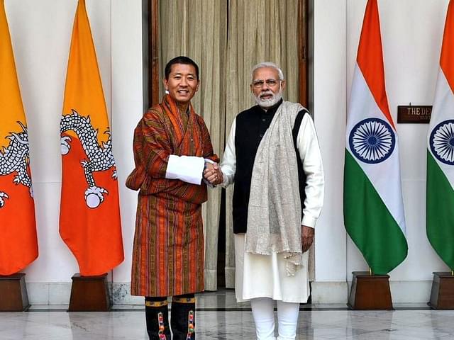 PM Narendra Modi (R) and PM of Bhutan  Dr Lotay Tshering (L) (Image courtesy of twitter.com/MEAIndia)