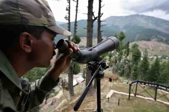 

A  soldier guards the line of control. (Farooq Khan-Pool/GettyImages)