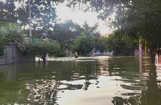 An area in Bengaluru flooded by the bund breach at Hulimavu lake(@amaljohn123/twitter)