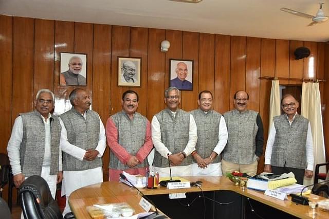Chief Minister Rawat with some of his cabinet colleagues. (@tsrawatbjp)