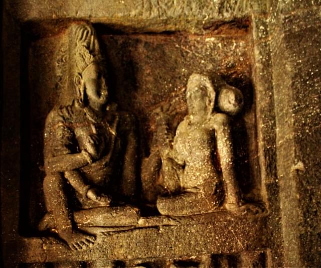 Shiva playing dice with Parvati (Ellora)