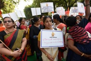 Members of Sabarimala Ayyappa Seva Samajam take part in a rally. (Biplov Bhuyan/Hindustan Times via Getty Images) 