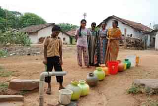 People struggle for water in Hassan district.&nbsp;