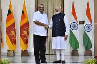 PM Modi with Sri Lankan President Rajpaksa (Pic Via Twitter)
