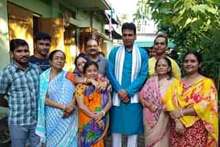 Tripura CM Biplab Kumar Deb visited a family on Sunday (@BjpBiplab/Twitter)