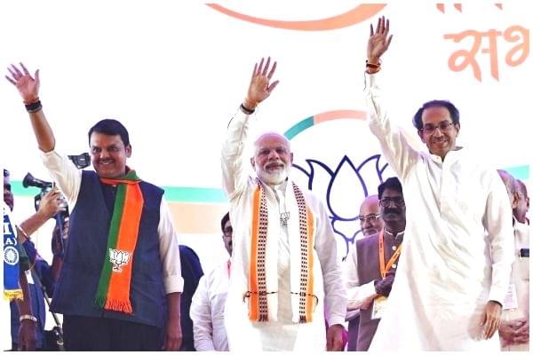 <b>IN HAPPIER TIMES: </b>Devendra Fadnavis, Narendra Modi and Uddhav Thackeray.