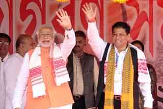 

PM Modi with Assam CM Sarbananda Sonowal/ Picture from narendramodi.in