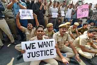 Police personnel protest. (via Twitter)