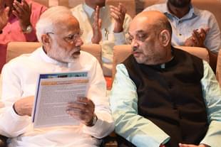 Prime Minister Narendra Modi with Home Minister Amit Shah. (Vipin Kumar/Hindustan Times via GettyImages) 