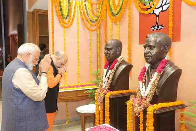 PM Modi and Home Minister Amit Shah paying their obeisance to Shyama Prasad Mukherjee.