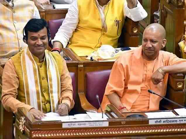 Minister Anand Swarup Shukla with CM Yogi Adityanath (Twitter/@anandswarupbjp)