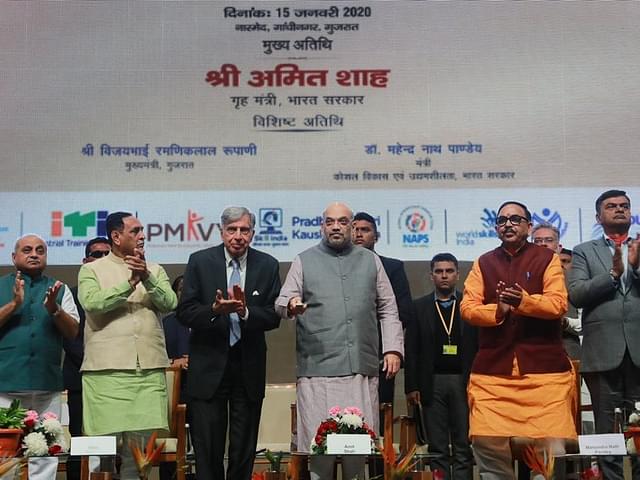 Union Home Minister with industrialist Ratan Tata among others. (Twitter/@BJP4India)