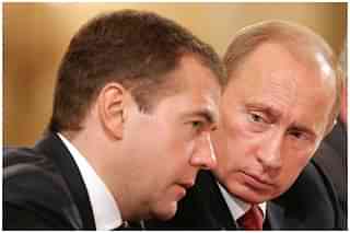 Dmitry Medvedev and Vladimir  Putin