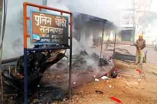 A police check post that was set ablaze in UP’s Lucknow (Twitter/@sbajpai2811)