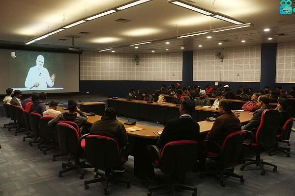 Students attentively listening to the PM via videoconferencing.&nbsp;