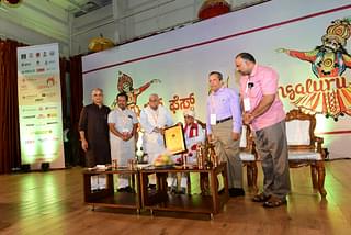 Chidananda Murthy being honoured with the Lifetime Achievement Award at the Mangalore Lit Fest.