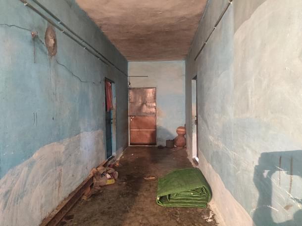 The door on the left opens into Dhan Prasad’s house. The one on its right is of Irfan’s house. The house on the right is also of an accused.