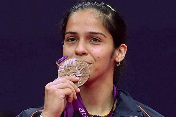 Saina Nehwal with her Olympic bronze medal (Pic via Twitter)