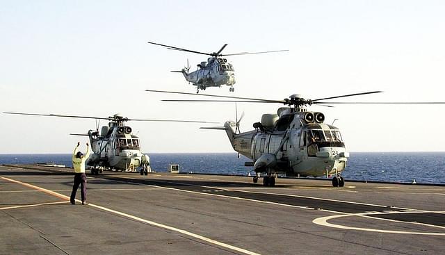 Indian Navy Sea King helos on an aircraft carrier.&nbsp;