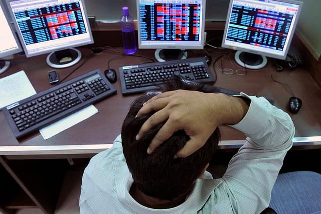 An investor reacts to stock market crash. (GettyImages)