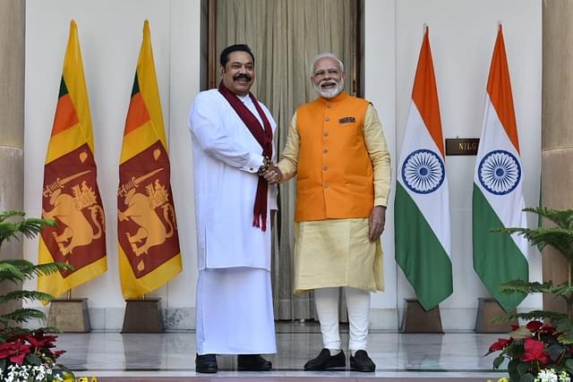 PM Modi with Sri Lankan PM Mahinda Rajapaksa (Pic Via Twitter)