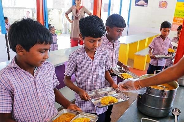 Children being served Akshaya Patra’s mid-day-meal (Pic via Akshaya Patra)