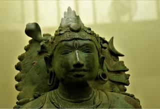 Bhikshadana form of Shiva : note the asymmetrical earrings. (Thanjavur Museum)