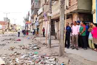 Residents of the lane in which Ankit Sharma’s house is located. The picture was clicked on 27 February/Swarajya