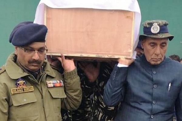 Rajnath Singh carrying the coffin of Pulwama Martyr (Pic via Twitter)