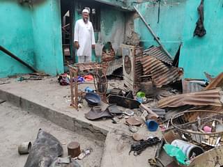 Mohammad Akhtar at his house that is completely gutted by fire.&nbsp;