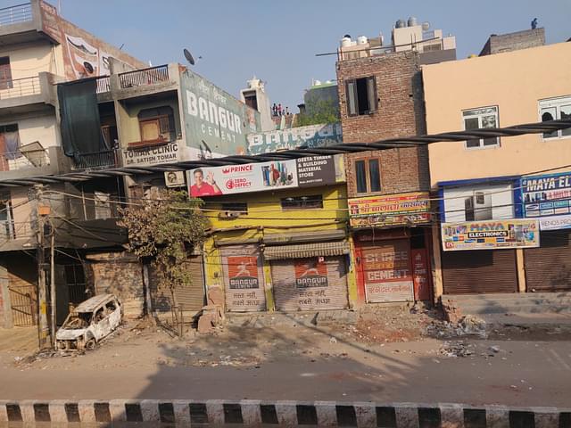 A stricture opposite Sushil Sharma’s house was burnt on the morning of 25 February 