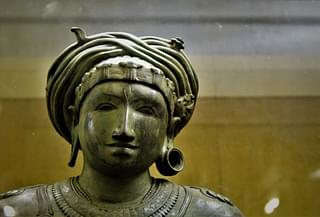 Rishaba Vahana Murthy: note the asymmetrical earrings: (Thanjavur Museum)