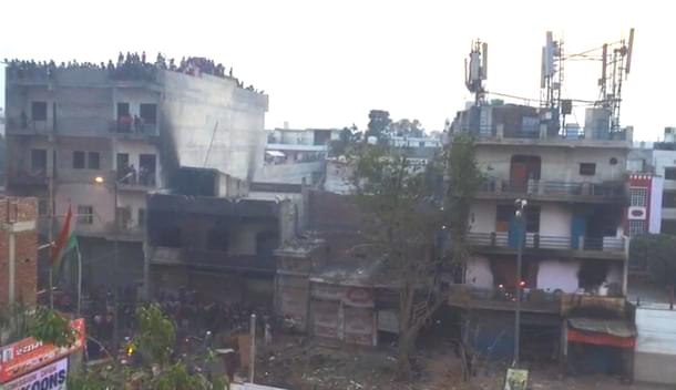 Still from the video on 25 February showing mob on Hussain’s building 