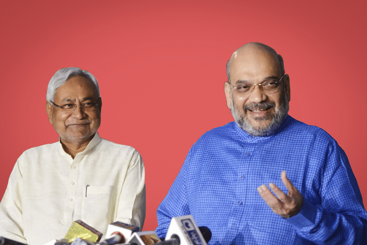 Bihar Chief Minister Nitish Kumar (L) with Amit Shah. (K Asif/India Today Group/Getty Images)