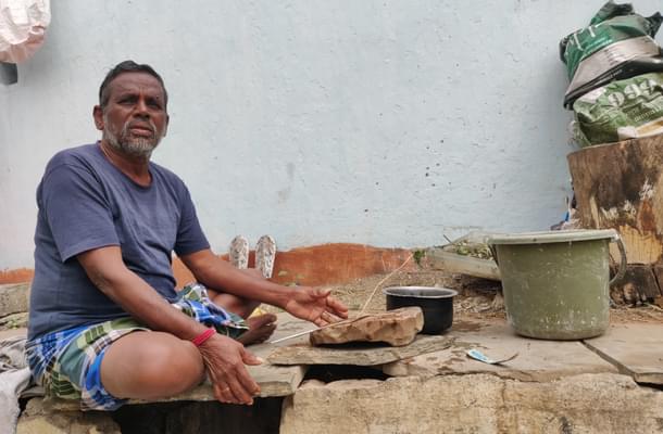Lingoji sharpening his butcher knives.