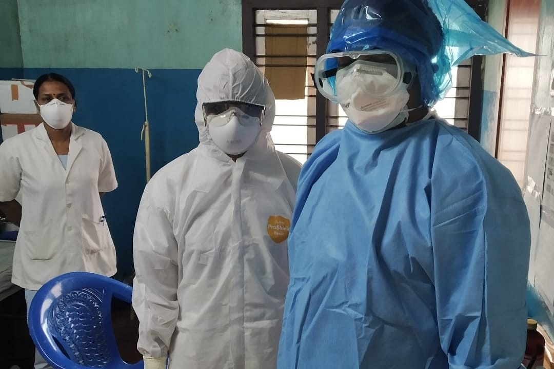 Healthcare workers in Kerala wearing PPE (Wikimedia Commons)&nbsp;