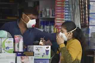 A customer buying face mask. (Picture: PTI )