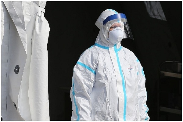 Doctor with protective gear - representative image