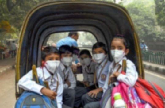 School-going children battling the recurring winter smog.