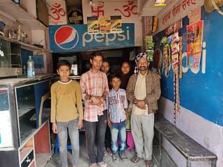 Shyam Sahni with family at his shop that was set on fire